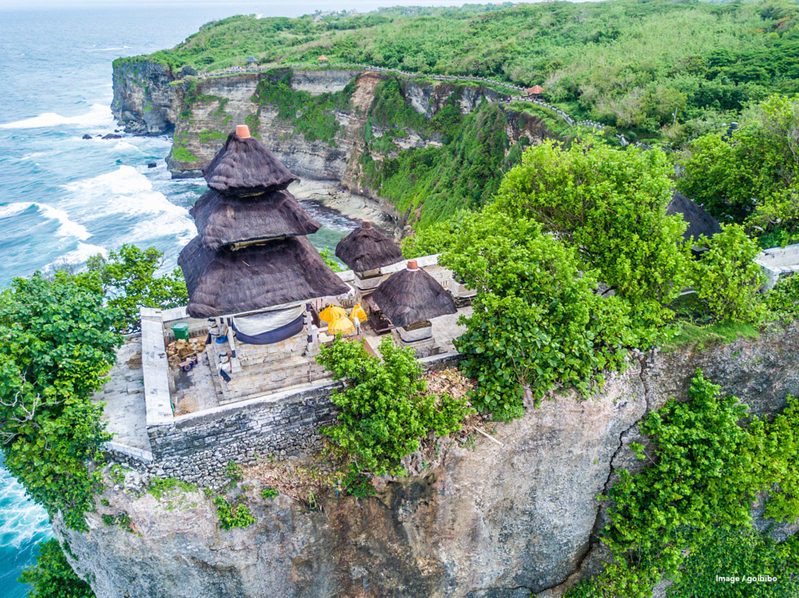 Uluwatu Temple Bali Overlooking the Indian Ocean, perched on a clff