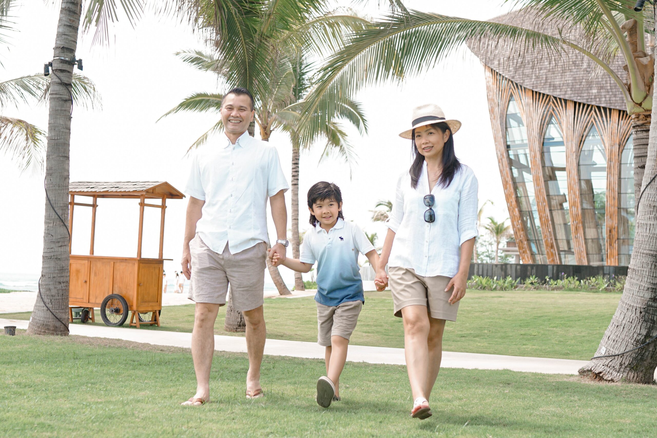 A family holding hands in Bali